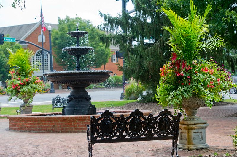 Alpharetta park featuring a bench and water fountain