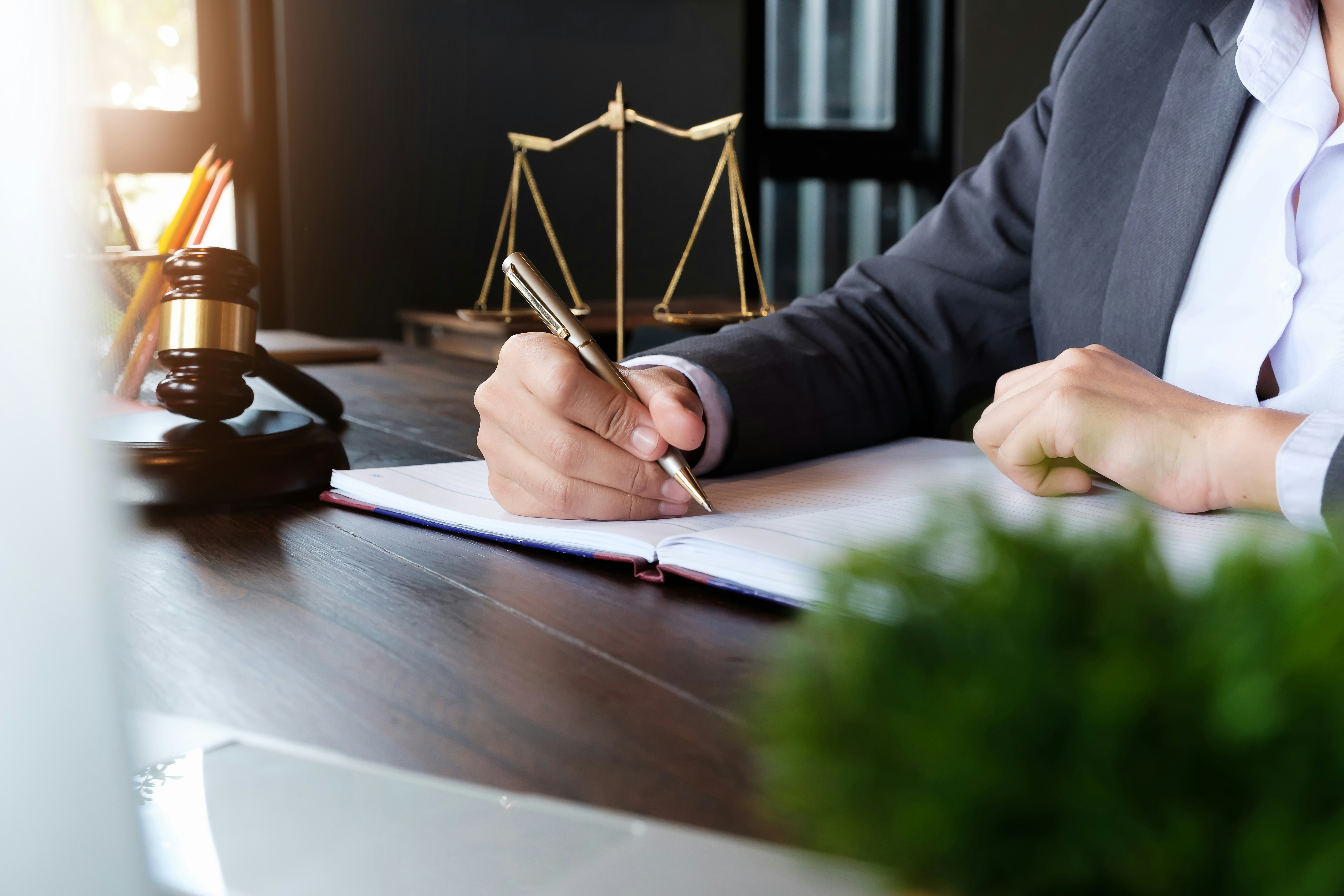 Attorney with pen on contract