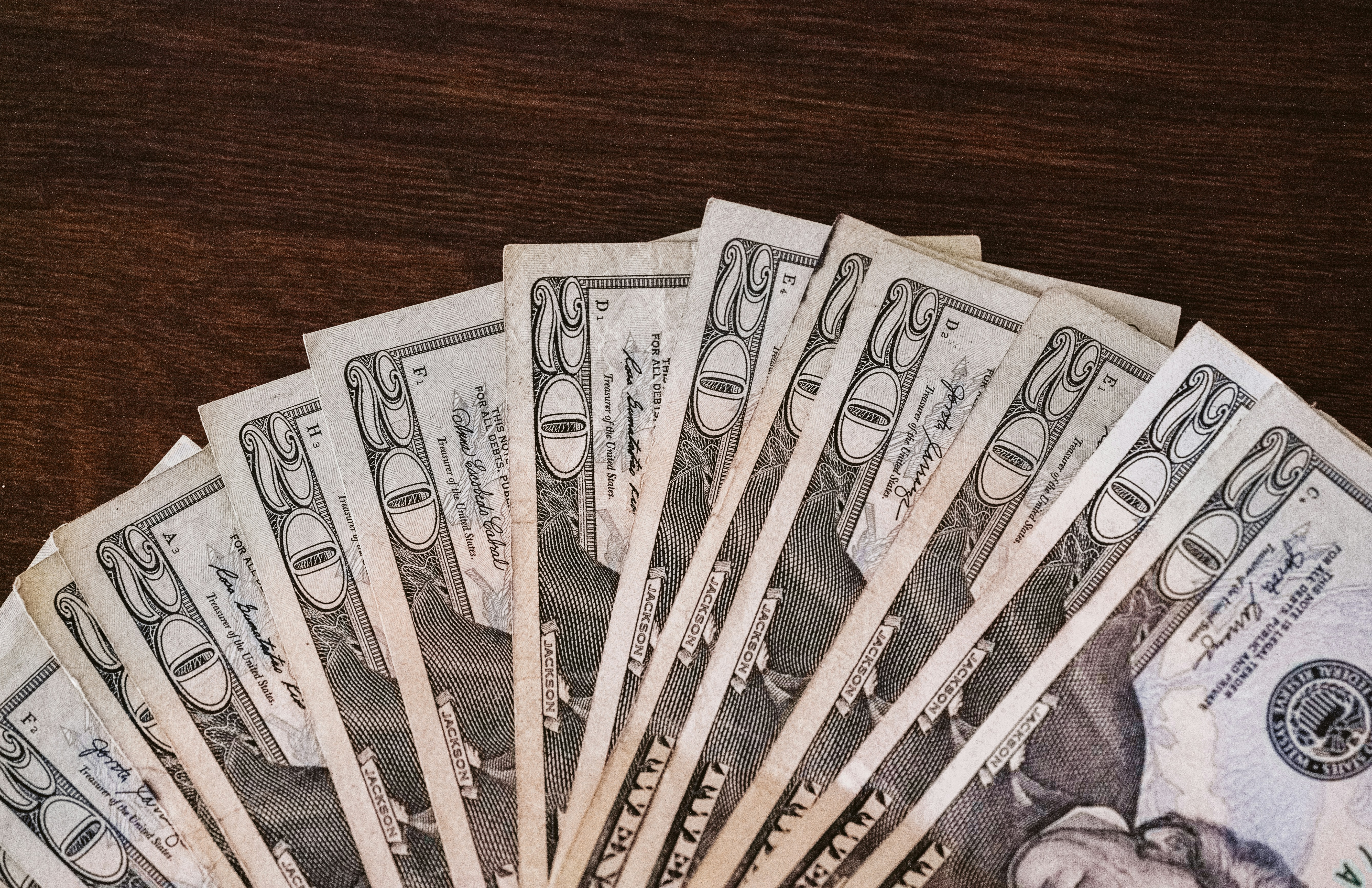 $20 bills on table